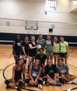 The varsity volleyball team are ready to succeed. Credit: Olivia Frejka