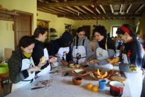 Students from a previous Spain trip cooking lunch Source: Spain Prep