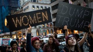 Women attending anti-Trump protests held in NYC Credit: Credit: Getty Images/Drew Angerer