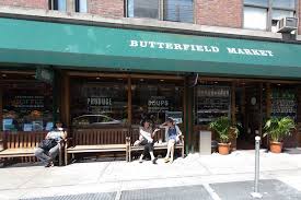 Students will often sit on the bench outside of Butterfield Market after buying food from there. Source: Shopikon